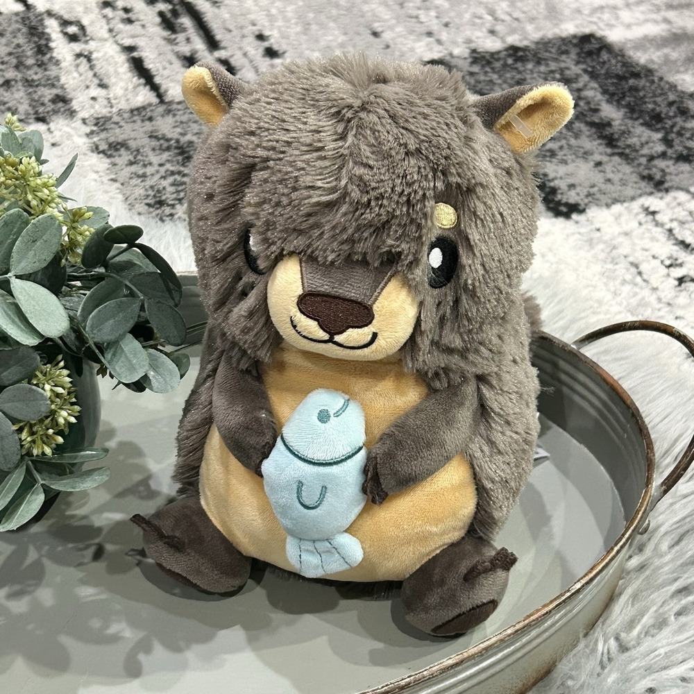 Squishable Mini River Otter Plush 9" Stuffed Animal Holding Blue Fish Brown Tan